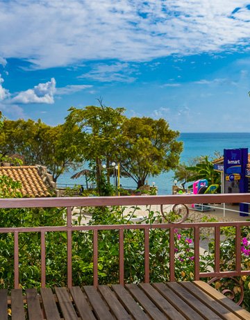 Balcony with sea view at Lemonia accommodations.
